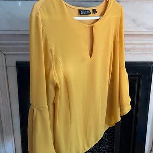 Yellow dressy top with flared arms